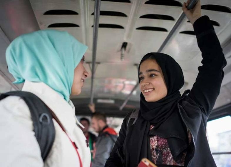 Two hijabi women on a bus